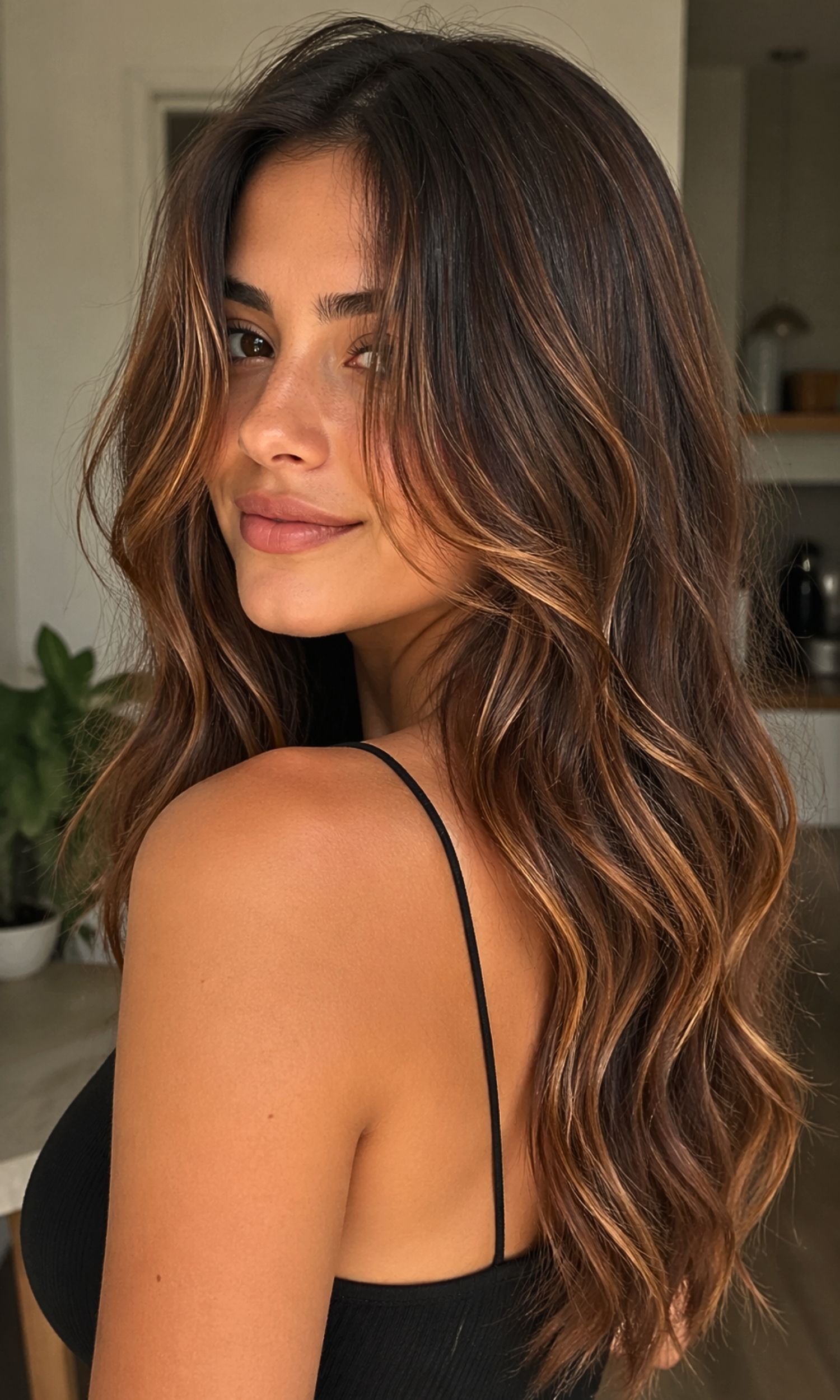 There’s something magical about hair that catches the light just right. I still remember the first time I added warm tones to my hair. It felt like my face lit up, even on a dull day. That’s the charm of warm-toned highlights that glow—they add life, softness, and a natural shine that feels effortless. Warm highlights are not just a trend. They are timeless. From golden honey to rich caramel, these shades suit many skin tones and moods. They bring warmth, depth, and a sun-kissed vibe that looks both polished and relaxed. In this guide, I’ll walk you through 15 glowing ideas, along with tips, personal insights, and simple advice you can actually use. 1. Honey Blonde Highlights for a Soft Glow Honey blonde highlights are like sunlight trapped in your hair. They add a gentle glow that feels natural and warm. I once tried this shade during winter, and it instantly made my skin look brighter and less dull. This tone works well on light to medium brown hair. It blends easily and does not look harsh. The beauty of honey blonde is its softness—it never feels too bold. It simply enhances what you already have. 2. Caramel Swirls for Rich Dimension Caramel highlights remind me of warm desserts—sweet, rich, and comforting. These tones create depth in darker hair without looking too dramatic. They move beautifully with your hair and catch light in a subtle way. If your hair feels flat or lifeless, caramel can fix that. It adds layers of color that look natural. It’s also easy to maintain, which is a big plus for busy routines. 3. Golden Highlights for a Sun-Kissed Finish Golden highlights give that “just came back from vacation” look. Even if you haven’t seen the sun in weeks, your hair will say otherwise. This shade reflects light beautifully and adds a soft shimmer. I love how golden tones brighten the face. They work well with warm skin tones and bring out natural warmth. It’s like carrying sunshine with you every day. 4. Copper Highlights for a Bold Warm Glow Copper tones are for those who want a little drama—but still warm and inviting. They shine brightly and add a fiery touch to your look. I once saw someone with copper highlights under sunlight, and it looked almost magical. These highlights work best on brown or auburn bases. They stand out without looking unnatural. If you want something unique yet wearable, copper is a great choice. 5. Auburn Highlights for Depth and Warmth Auburn highlights feel deep and cozy, like autumn leaves. They add richness and warmth to dark hair. This tone is perfect if you want something noticeable but still subtle. Auburn blends well and does not fade quickly. It gives your hair a polished look without much effort. It’s a great option for those who prefer low-maintenance beauty. 6. Bronze Highlights for a Metallic Glow Bronze tones bring a soft metallic shine to your hair. They sit between brown and gold, creating a balanced warmth. I find bronze highlights perfect for adding a modern touch without going too bold. They look amazing under natural light. The shine feels natural, not artificial. It’s like your hair has its own glow filter. 7. Cinnamon Highlights for Spicy Warmth Cinnamon highlights are warm, rich, and slightly spicy in tone. They add a reddish-brown glow that feels unique. I tried this once, and it made my hair look fuller and more vibrant. This shade works well in cooler months. It adds warmth when everything else feels dull. It’s a subtle way to stand out. 8. Butterscotch Highlights for a Creamy Finish Butterscotch tones are soft and creamy. They sit between blonde and caramel, creating a smooth blend. These highlights give a polished yet relaxed look. They are perfect for medium hair tones. The color feels gentle and does not overpower your natural shade. It’s a great choice for first-time highlights. 9. Amber Highlights for a Radiant Shine Amber tones glow like warm gemstones. They bring a rich, golden-red shine that looks stunning in sunlight. I always think of amber as a statement shade that still feels natural. It adds brightness without being too loud. Amber highlights work well on darker bases. They create a soft contrast that looks elegant. 10. Rose Gold Highlights for a Trendy Warm Twist Rose gold blends warm gold with a hint of pink. It’s trendy but still soft. I love how it adds a playful touch without going too bold. This shade works best on lighter hair. It reflects light beautifully and gives a fresh, modern look. It’s perfect if you want something different but still wearable. 11. Warm Beige Highlights for a Subtle Glow Warm beige is soft and neutral but still carries a hint of warmth. It’s ideal for those who want a natural look. These highlights blend seamlessly and look effortless. They are great for everyday style. You won’t feel like you changed your hair too much, yet the difference is clear. It’s quiet beauty at its best. 12. Toffee Highlights for Sweet Depth Toffee tones are rich and slightly darker than caramel. They add depth without losing warmth. I find this shade perfect for adding contrast to dark hair. It gives a glossy finish that looks healthy. Toffee highlights also grow out nicely, which means fewer touch-ups. That’s always a win. 13. Strawberry Blonde Highlights for a Soft Glow Strawberry blonde blends red and blonde tones. It creates a soft, romantic glow. This shade feels fresh and youthful. It works best on lighter hair bases. The color catches light gently and adds warmth without being too strong. It’s perfect for a soft, dreamy look. 14. Mahogany Highlights for Deep Warm Tones Mahogany is deep, rich, and slightly red. It adds a bold yet elegant warmth. I love how it transforms dark hair into something more vibrant. This shade works well for those who want a dramatic change without going too bright. It feels classy and timeless. 15. Sunlit Balayage with Warm Tones Balayage with warm tones gives a natural, blended look. It feels like your hair was kissed by the sun. This technique creates soft transitions between shades. It’s low maintenance and grows out beautifully. You don’t need frequent salon visits. It’s perfect for a relaxed, glowing style.
